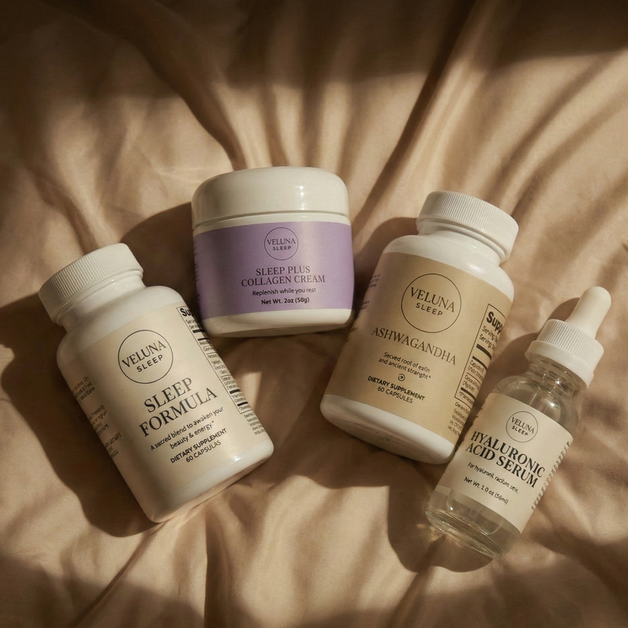 Veluna Sacred Soothe Full Bundle, Sleep Formula, night cream jar, Ashwagandha and serum lying on cream bedding