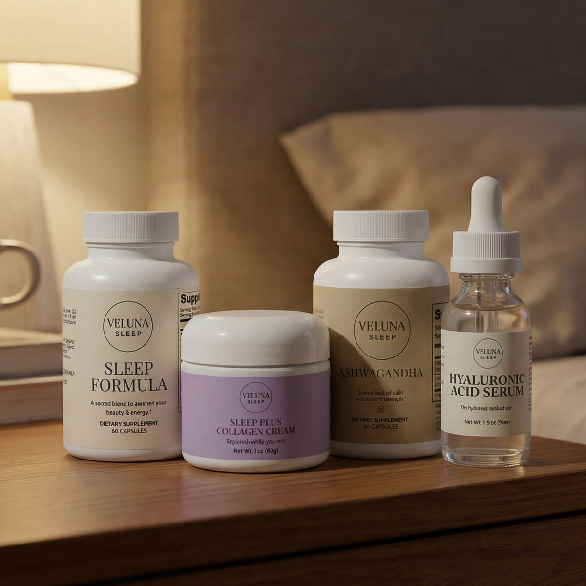 Veluna Sacred Soothe Full Bundle, two capsule bottles, lavender cream jar and serum on a nightstand by a lamp