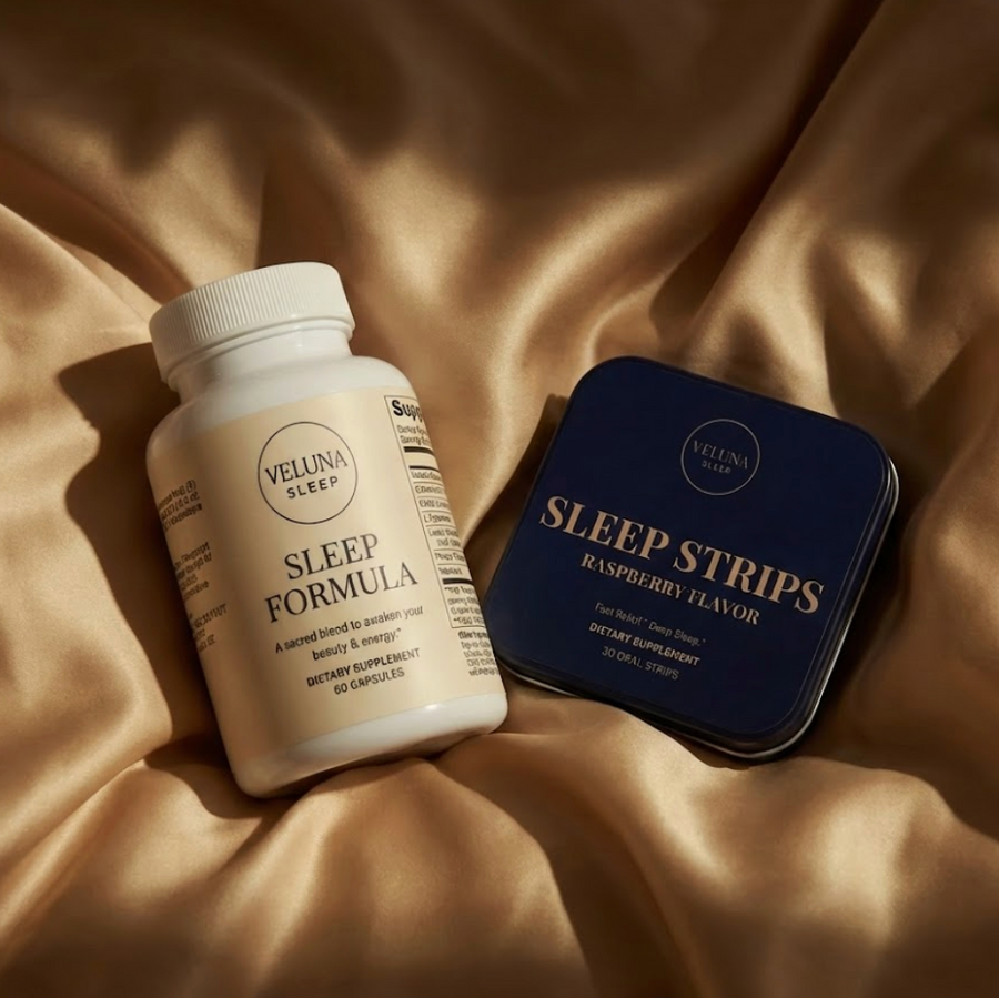 Veluna Mind Calm Booster Bundle, Sleep Formula bottle and Sleep Strips tin lying on golden satin