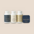Veluna Mind Calm Full Bundle, Magnesium Glycinate, Sleep Formula, Ashwagandha and Sleep Strips in a row on white, on a warm linen background