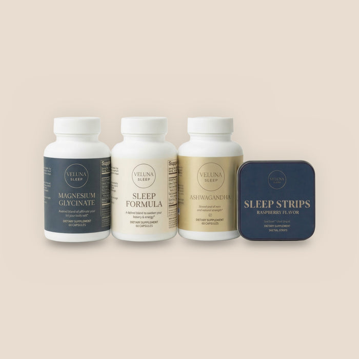 Veluna Mind Calm Full Bundle, Magnesium Glycinate, Sleep Formula, Ashwagandha and Sleep Strips in a row on white, on a warm linen background