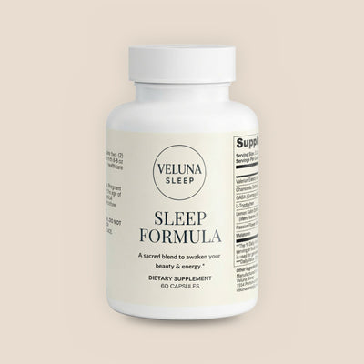 Veluna Sleep Formula Capsules, 60-count bottle with a cream label, pack shot on a warm linen background