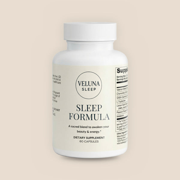 Veluna Sleep Formula Capsules, 60-count bottle with a cream label, pack shot on a warm linen background
